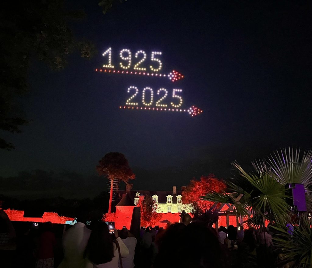 Spectacle of luminous drones displaying 1925 - 2025 to celebrate a company centenary